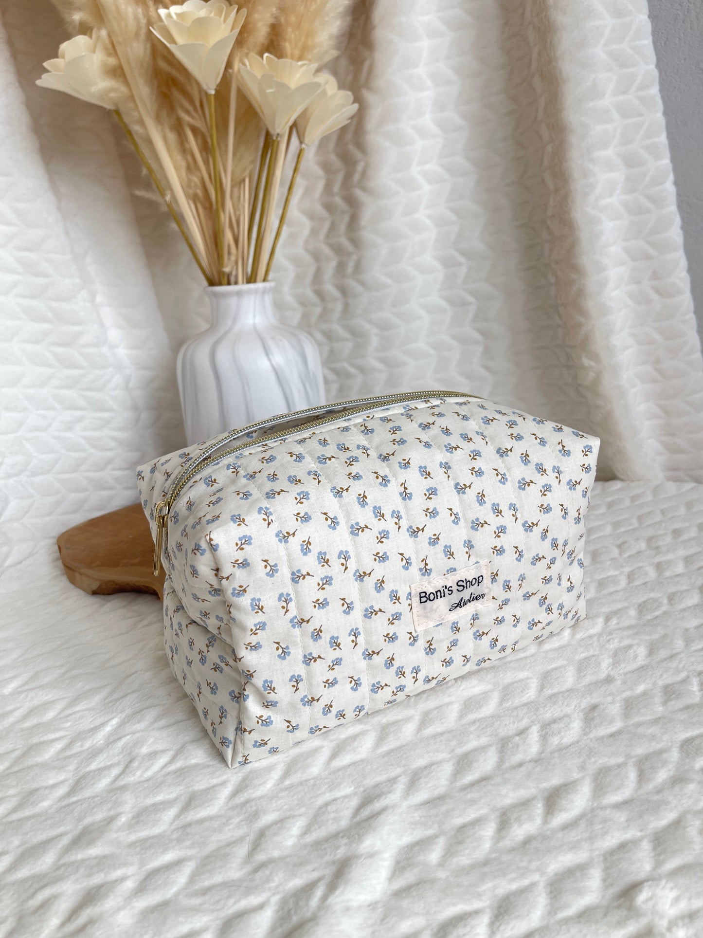 Trousse de toilette matelassée