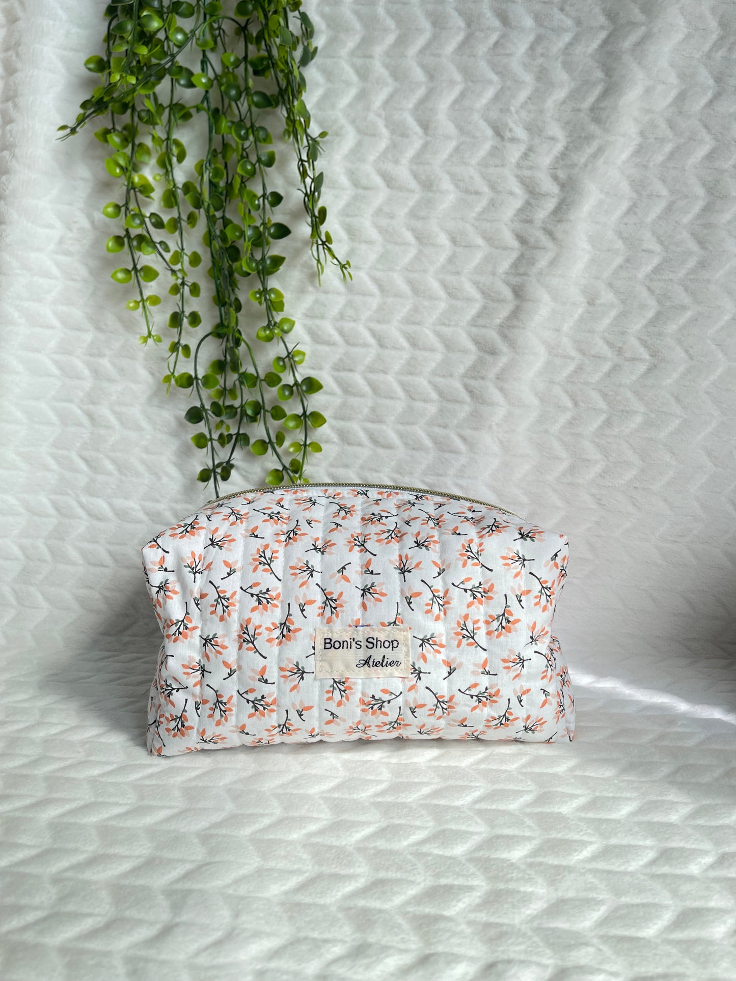 Trousse de toilette matelassée