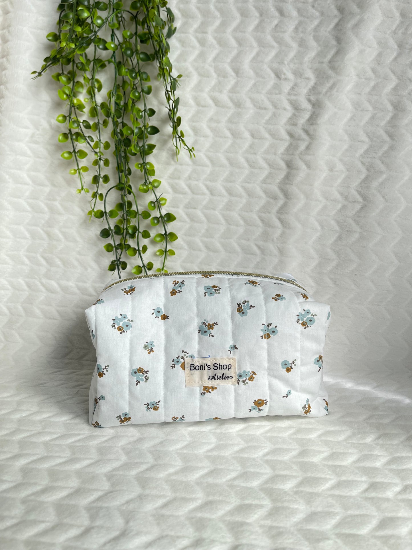 Trousse de toilette matelassée